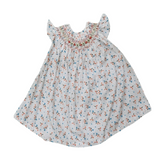 Ivory Bloom: A Delicate Dress With Hand Smocking And Intricate Yoke Embroidery