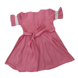 Blush Bloom: Delicate Embroidery On A Soft Pink Dress