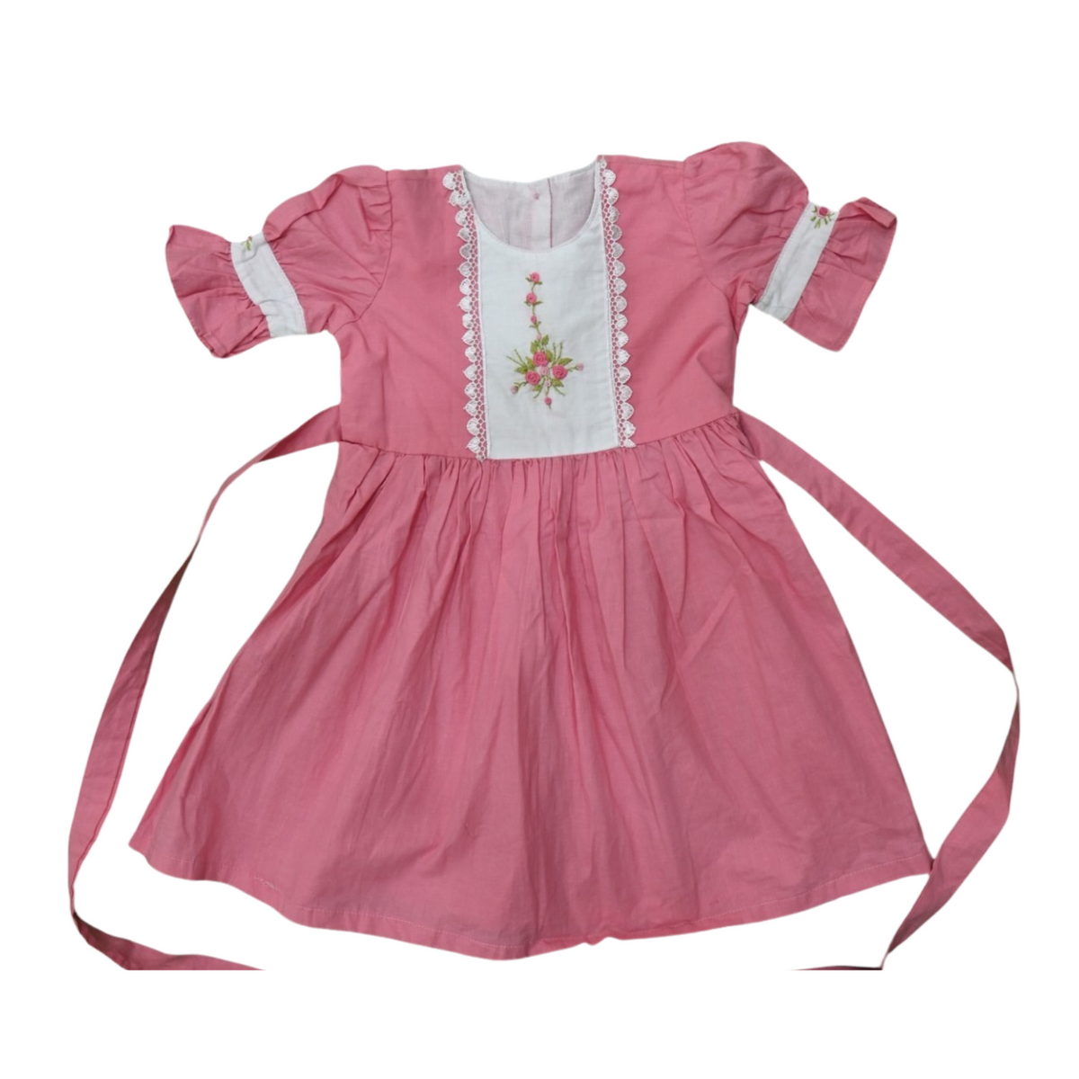 Blush Bloom: Delicate Embroidery On A Soft Pink Dress