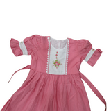 Blush Bloom: Delicate Embroidery On A Soft Pink Dress