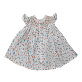 Ivory Bloom: A Delicate Dress With Hand Smocking And Intricate Yoke Embroidery